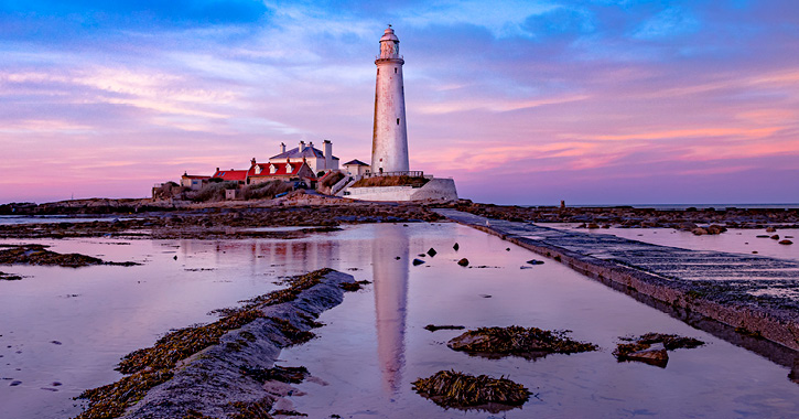 View of St Mary's Lighthouse, reflection in water, Whitley Bay